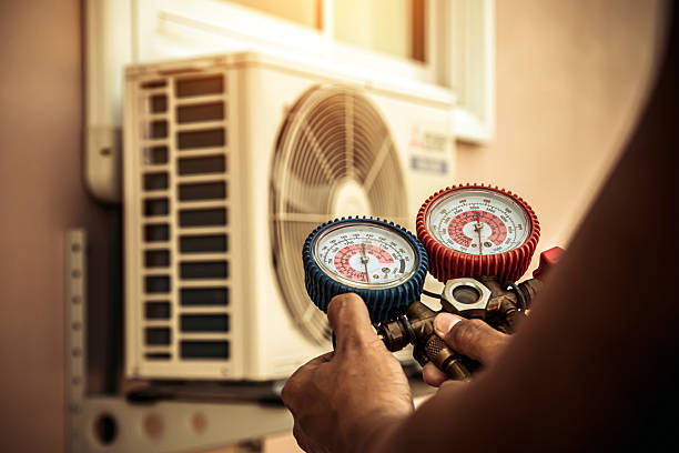 Professional Ac Installation technician working in Winfield, AL
